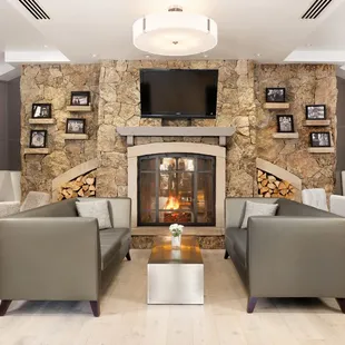 Lounge by our wood-burning fireplace