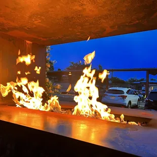 Outdoor seating area by firepit