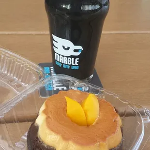A pint of roasty grain flavored Marble stout, plus a chocolate flan from the Rio Tacos food truck.