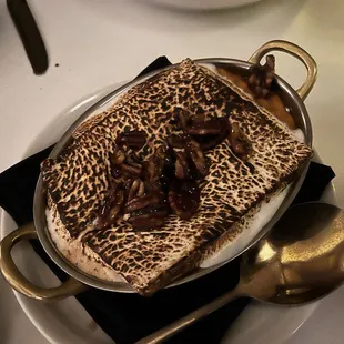 Sweet mashed potato with marshmallow and pecans on top