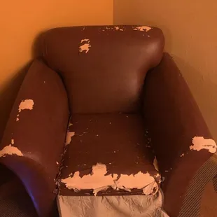 The chair in the room was in horrible condition they threw a little cover over it but it didn't hide all the stuffing coming out