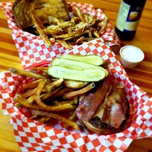 Reuben sandwich on top. Pickles, peanut butter, and bacon burger on bottom. Happy bellies all around.