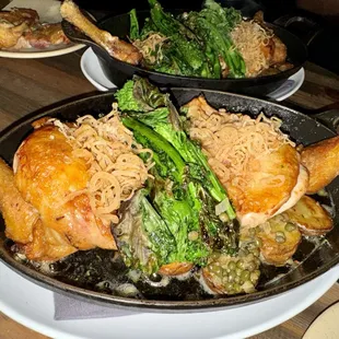 Snow dance farms chicken under a brick