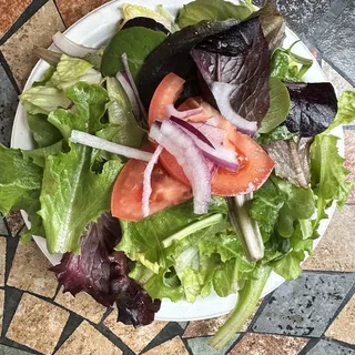 Pan of house salad and balsamic vinaigrette
