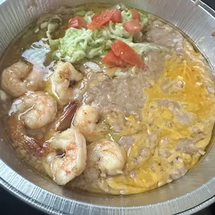 Camarones al mojo de Ajo (saturated in garlic butter) $24.50