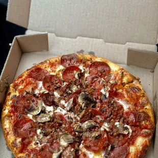 Pepperoni, bacon, mushrooms