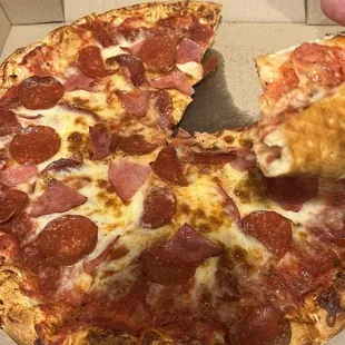 Pizza was delicious packed with cheese and flavor!!