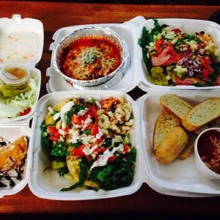 Side salad, eggplant rollatini, italian panini, spinach and artichoke dip, chicken Caesar panini, and cannoli for one.