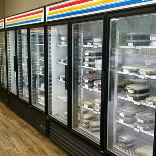 Eight freezers hold multiple sizes and types of dishes.   Not pictured,  a couple refrigerators.
