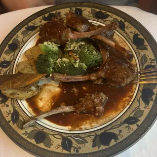 Lamb chops in red sauce.