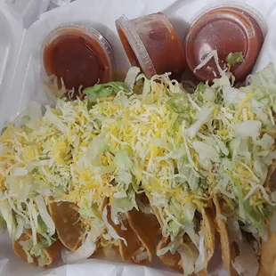 Crunchy shredded beef tacos 2/$1.80  bomb. Com