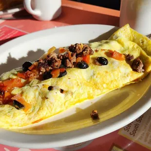 2 Meat Omelet with tomatoes and black olives