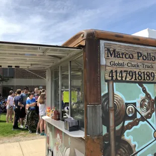 a group of people standing in line