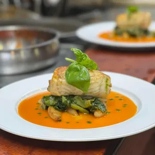 Stuffed Filet of Sole with Shrimps &amp; Calamari over Escarole with Lobster Sauce