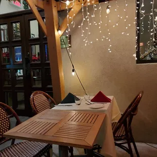 a table and chairs in a restaurant