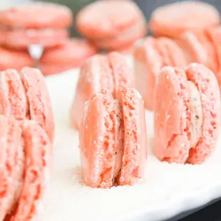 pink macarons on a white plate