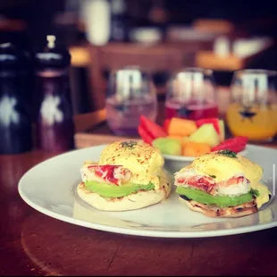 two eggs benedicts on a plate