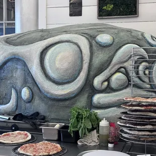 The most Radical pizza oven I have ever seen! Represents the beauty of the river the place is on so well!