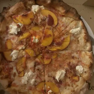 Peach pizza, bacon, the right cheese to die for.. (sorry the bad quality pic) trust that it's good...