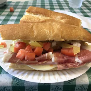 Marcos special...diced onions, pickles, cherry peppers, tomato, and oil and vinegar.