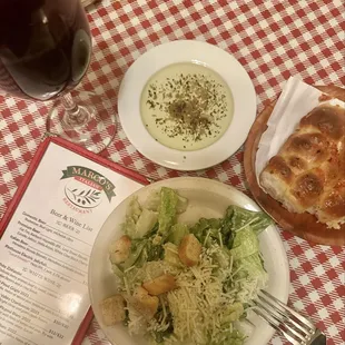 Cesar salad with delicious dressing and fresh cheese.