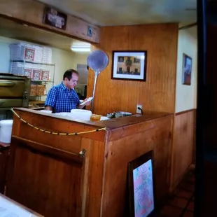 a man sitting at the counter