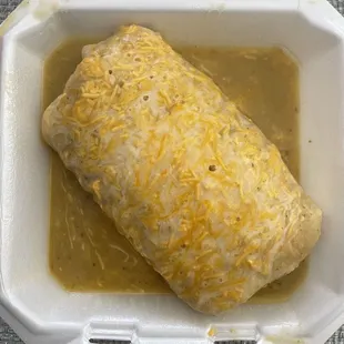 Smothered Steak Breakfast Burrito With Bacon And Extra Cheese