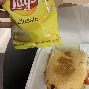 Turkey sandwich (toasted) w/ cheese, lettuce, tomato, and Mayo packet (they do NOT have mustard) Comes with chips and pickle