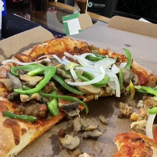 They obviously recycled a meat pizza and added raw slightly warm veggies ontop...its gross.