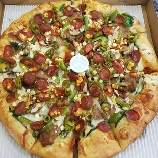 Large, regular crust, and a ton of random toppings I was craving.