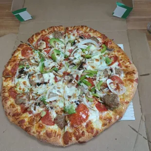 A deluxe pizza, loaded with toppings and flavor!