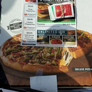 a pizza box with a pizza on it