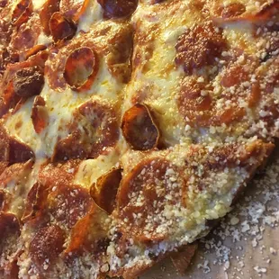 a pepperoni and cheese pizza