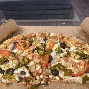 a slice of pizza in a box