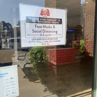 a sign in the window of a restaurant