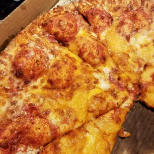 Improperly proofed dough or dough that is cooked too cold results in crust bubbles as pictured on this Big Cheese...not much cheese, either.