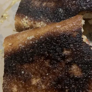 Bottom of pepperoni calzone (burnt but I still ate it lol)