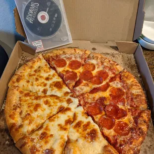 We started eating before I could grab a pic!  Half white/half pepperoni pizza with our free movie.