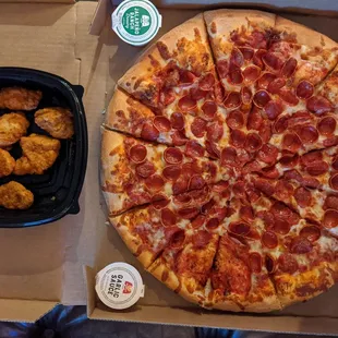 Extra large pizza, chicken dippers and a 2 ltr for $19.99