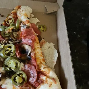 a slice of pizza in a box