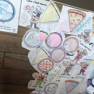 They let the children color pictures while waiting! It's so cute.