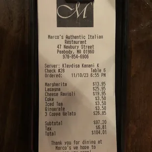 Check/Receipt for meal showing prices.