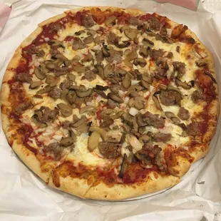 Here is a large special, sausage mushroom onion! Cooked to perfection.