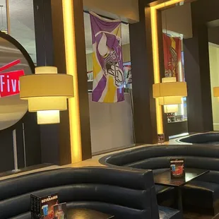 Comfy booths to enjoy a drink or meal with friends at Marcus' Oakdale's Take 5 Lounge.