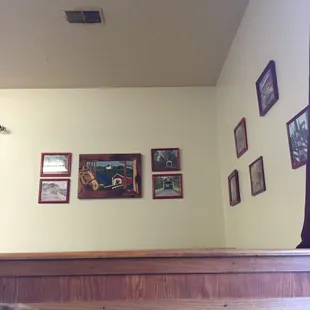 a wall with pictures of animals on it