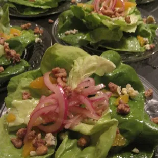 Salad with pickled onions and candied walnut. Find a recipe for this @ http://blogs.westword.com/cafesociety/recipes/