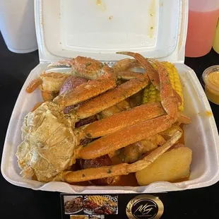 Seafood with a cluster of crab legs.