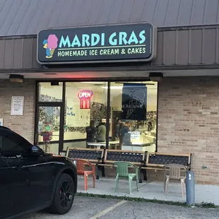 a car parked in front of the store