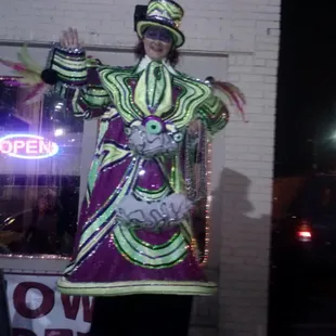 Lots of pictures and handing out beads. She is certainly a hit!!