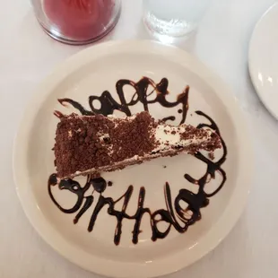 Cherry chocolate cake. Had a candle and little sign on it when they brought it our